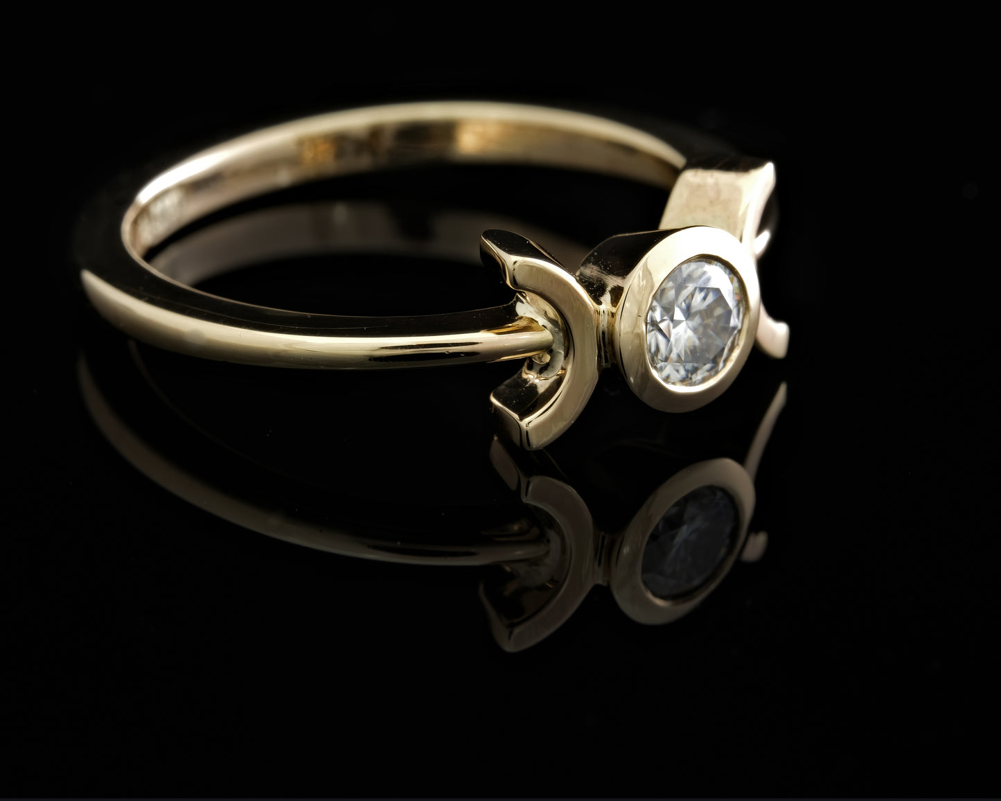 Moissanite and Gold Solitaire Ring