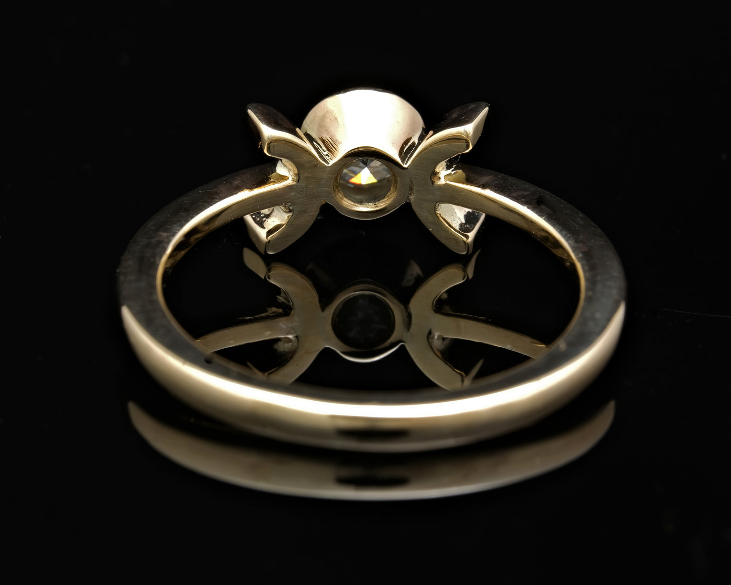 Moissanite and Gold Solitaire Ring