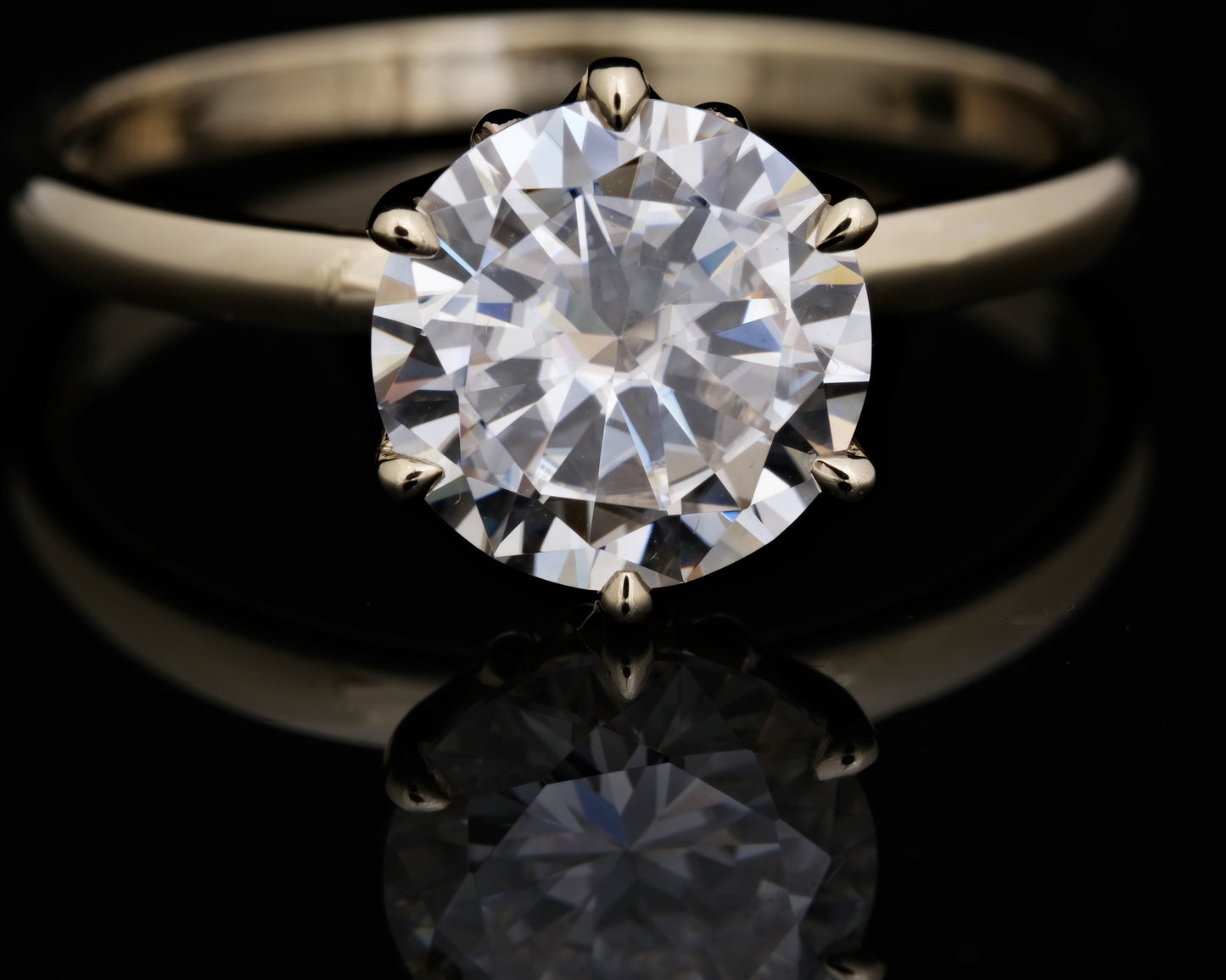 Gold and Moissanite Solitaire Ring