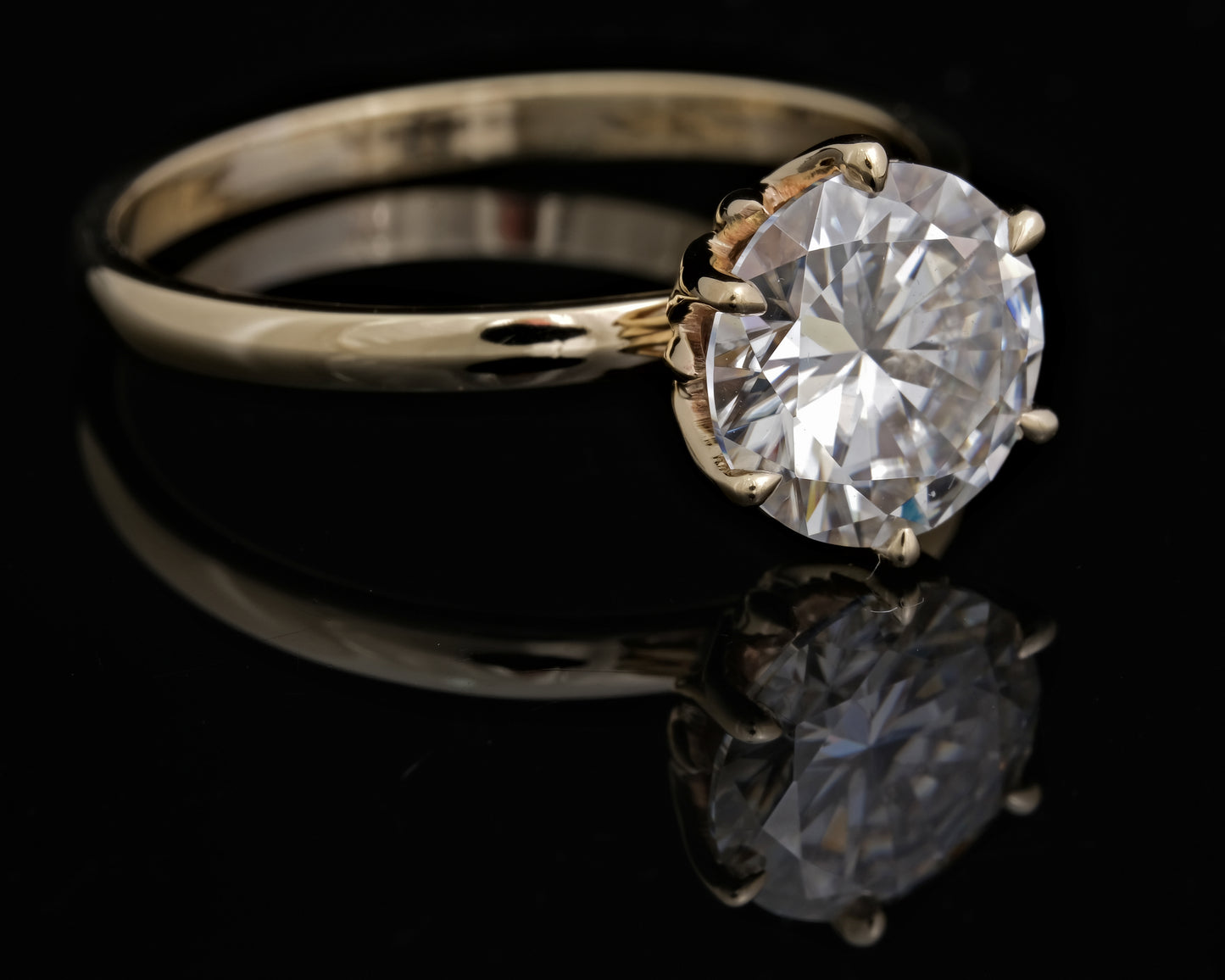 Gold and Moissanite Solitaire Ring