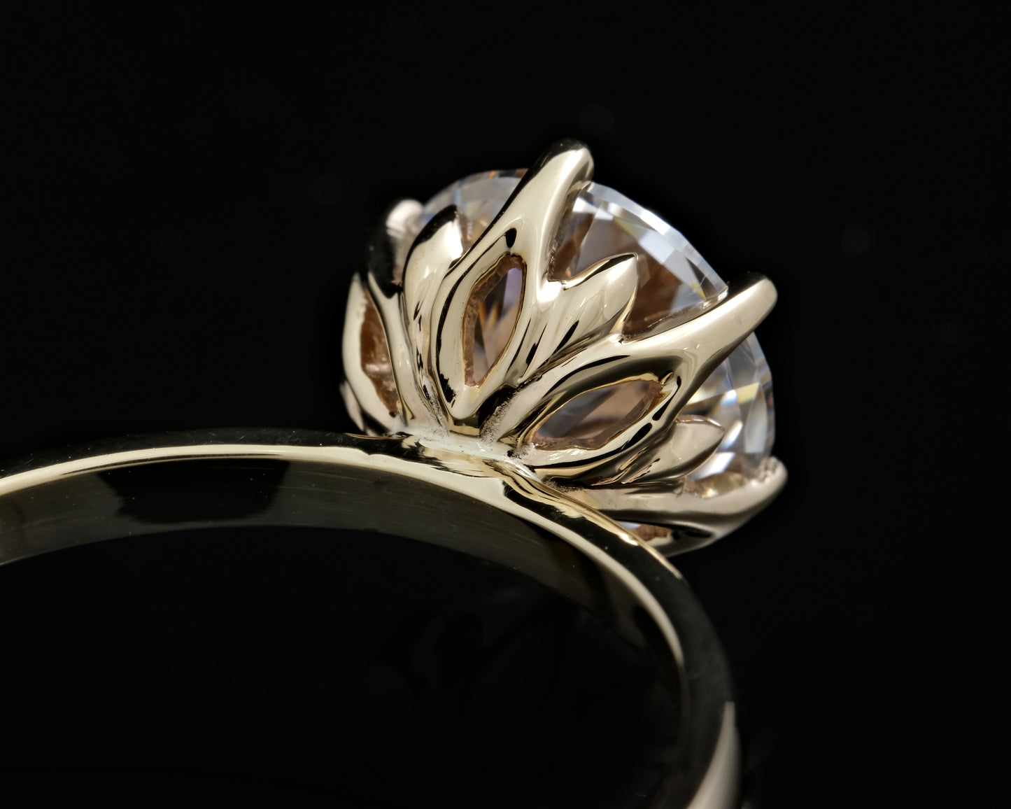Gold and Moissanite Solitaire Ring