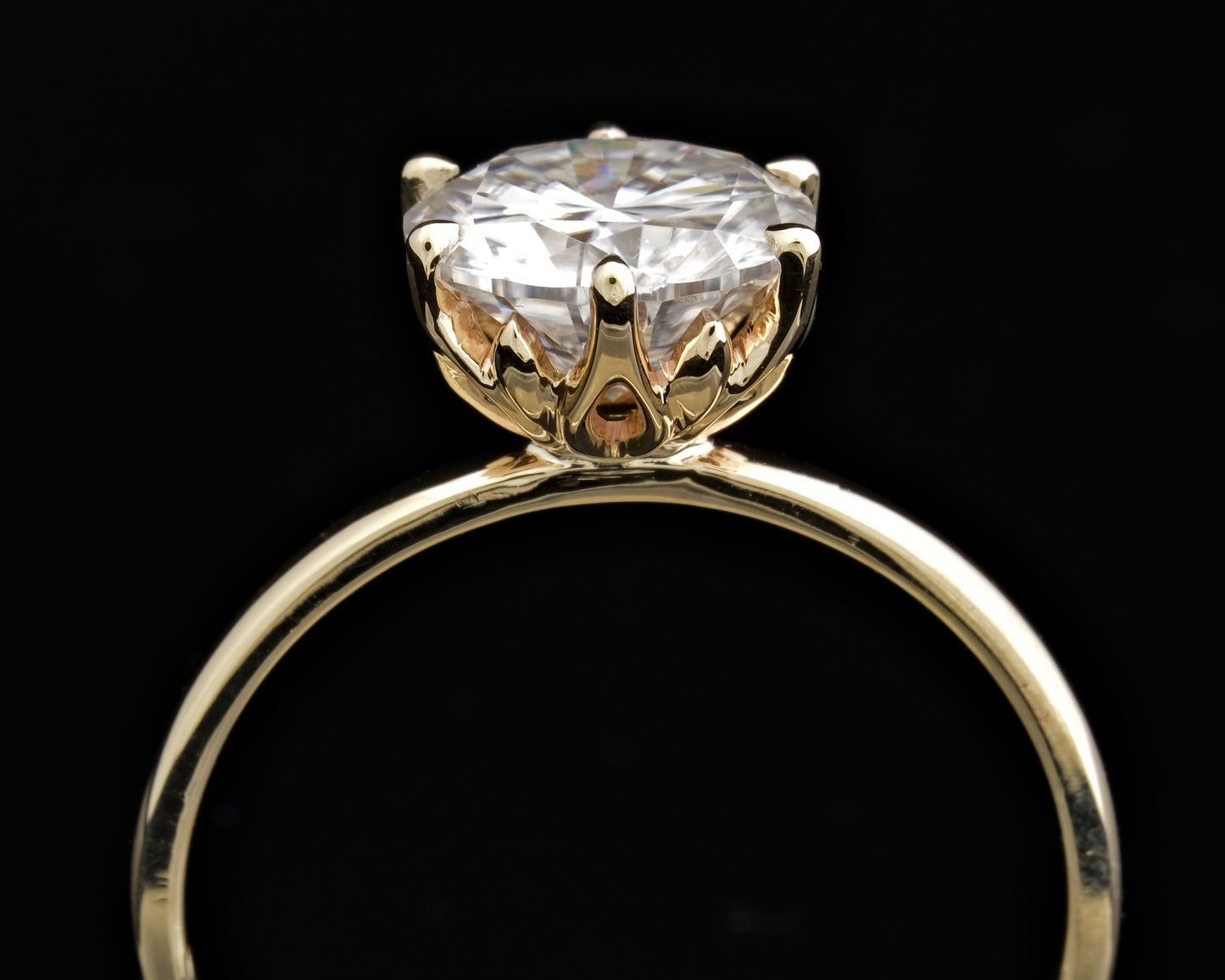 Gold and Moissanite Solitaire Ring